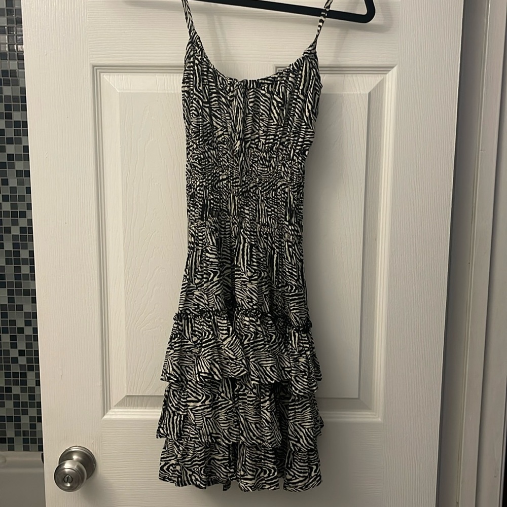 Ruffled black and white beach dress.